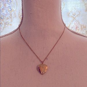 Gold tone locket